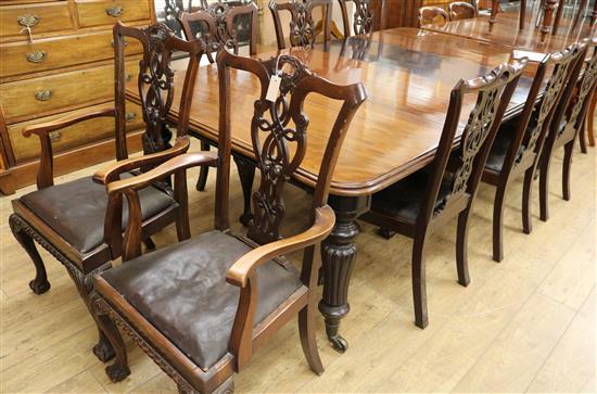 A Victorian mahogany extending dining table and eight Chippendale revival chairs 237cm fully extended